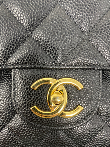 Vintage: Chanel Black Caviar Leather Classic Double Flap Maxi with Silver Hardware