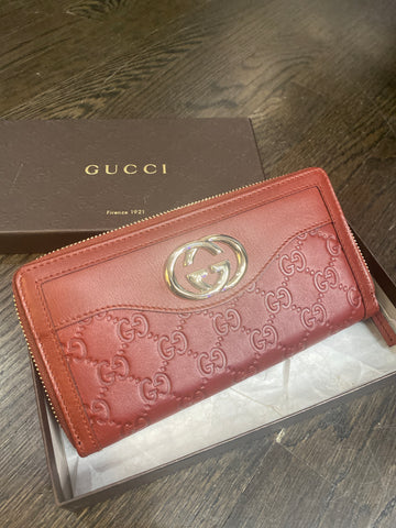 Vintage: GUCCI Rust Leather Embossed Zip Around Wallet
