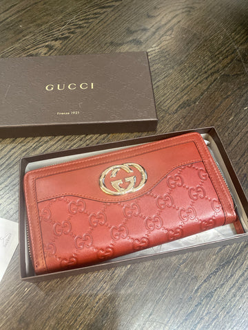 Vintage: GUCCI Rust Leather Embossed Zip Around Wallet