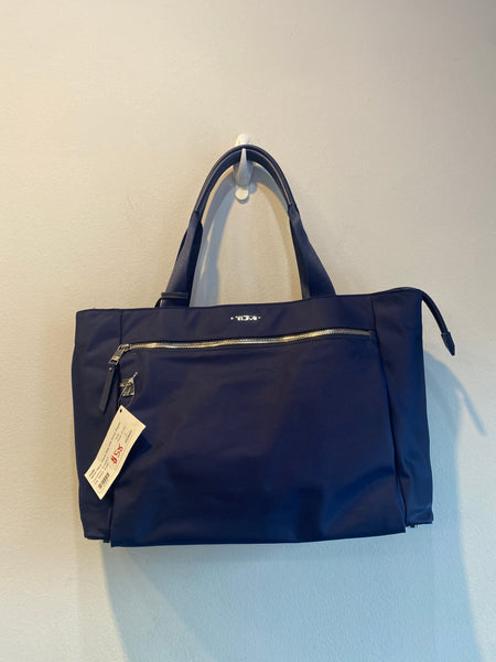 Tumi Nylon Navy Travel Bag with Silver Zipper and Suitcase Strap