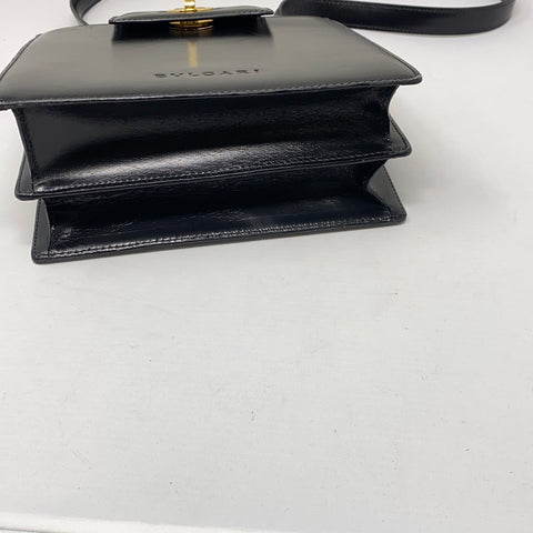 Vintage: BVLGARI black leather single flap Shoulder bag with gold closure and turn lock