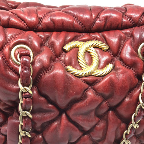 VINTAGE: Chanel Deep Red Leather Quilted double handle Bubble bag with gold textured CC