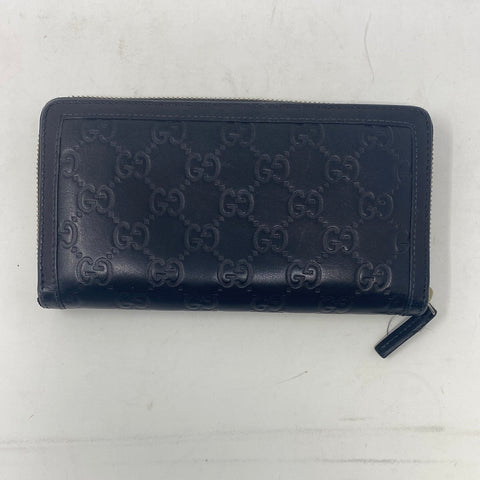 Vintage: Black Leather Embossed GG Zip Around Wallet