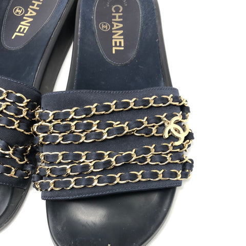 Chanel navy Tropiconic slides with gold chain and cc